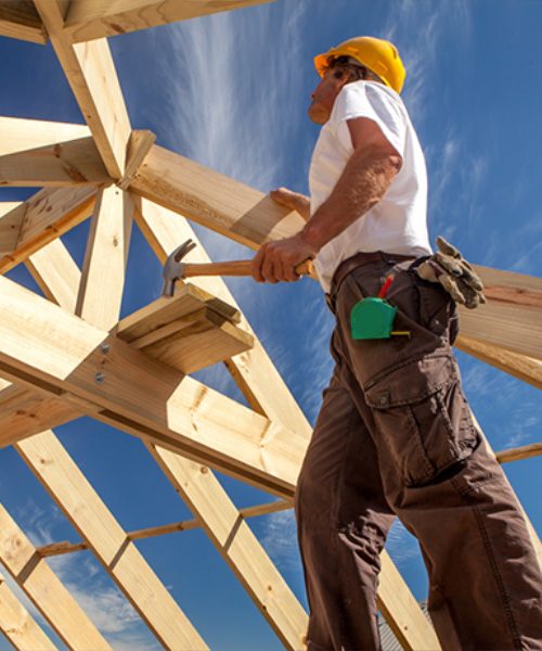 Insured4Construction - A roofer doing work on a timber roof